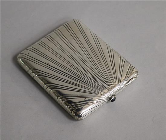 An Estonian 875 white metal cigarette case with cabochon thumbpiece,